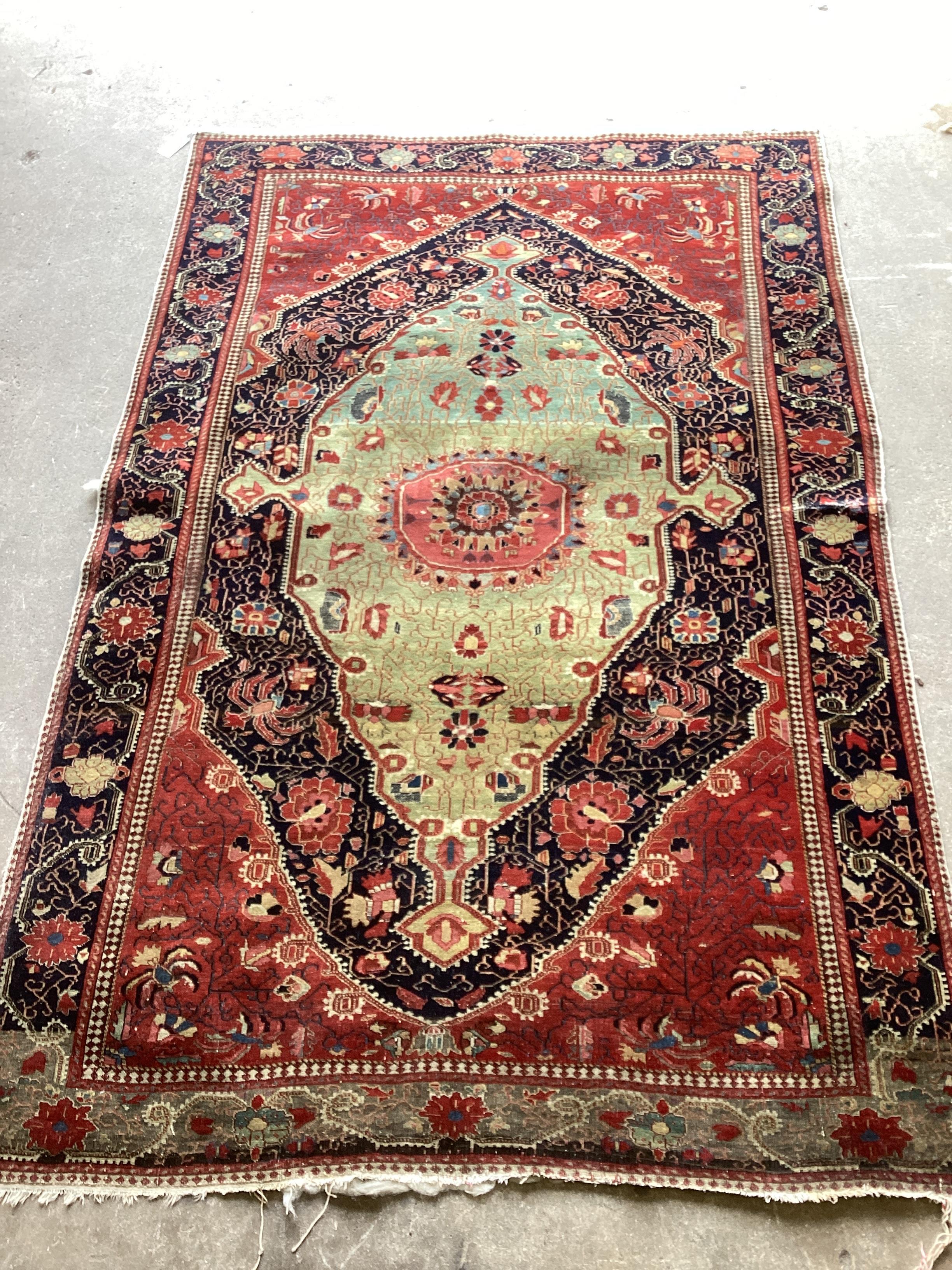 A North West Persian rug, 213 x 136cm